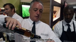 Bernard Gutman pouring a Singleton at Whisky Live SA