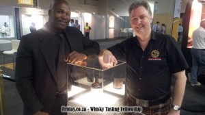 Ian MacMillan and bodyguard protecting the Bunnahabhain 40yo at Whisky Live SA