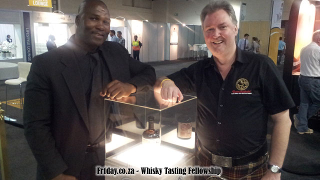 Ian MacMillan and bodyguard protecting the Bunnahabhain 40yo at Whisky Live SA